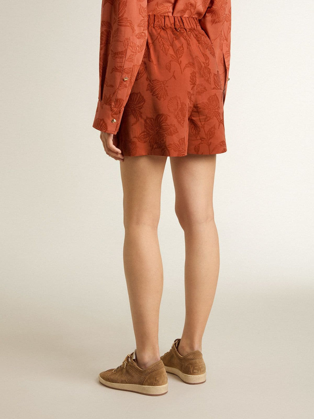 Golden Goose Women's shorts in brick-red jacquard with marine floral pattern