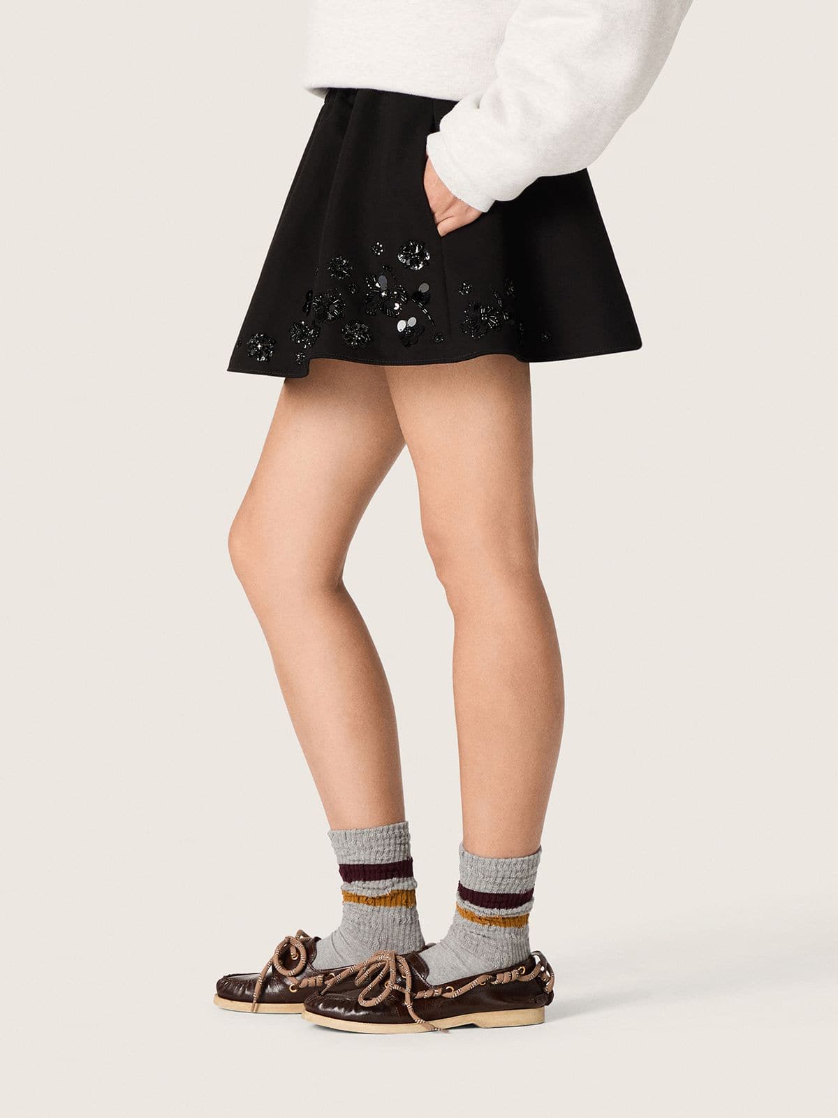Golden Goose Women’s miniskirt in black cotton twill with floral sequin embroidery