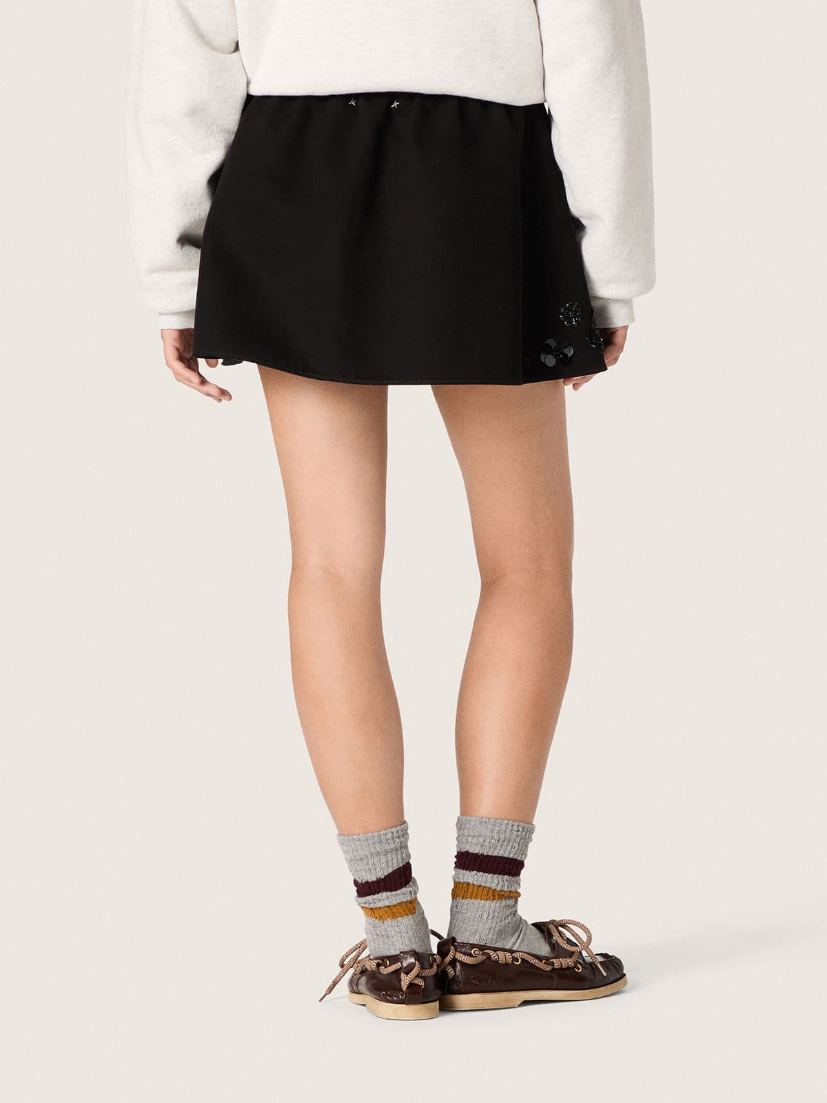 Golden Goose Women’s miniskirt in black cotton twill with floral sequin embroidery