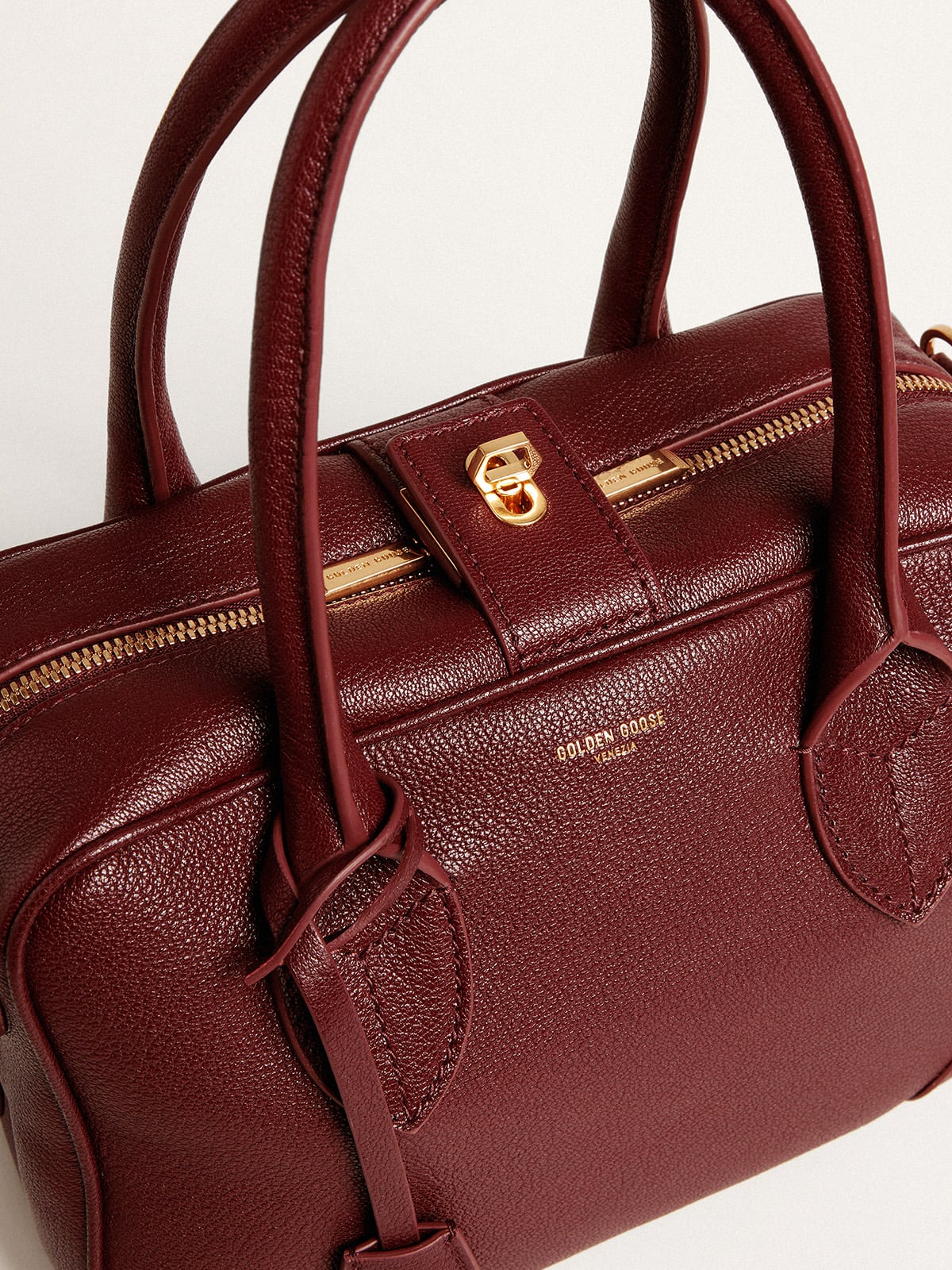 Golden Goose Vita Bag in burgundy leather with gold details