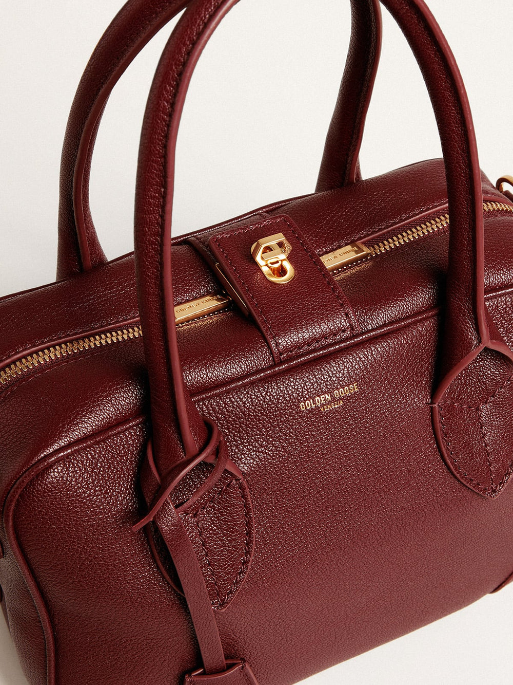 Golden Goose Vita Bag in burgundy leather with gold details