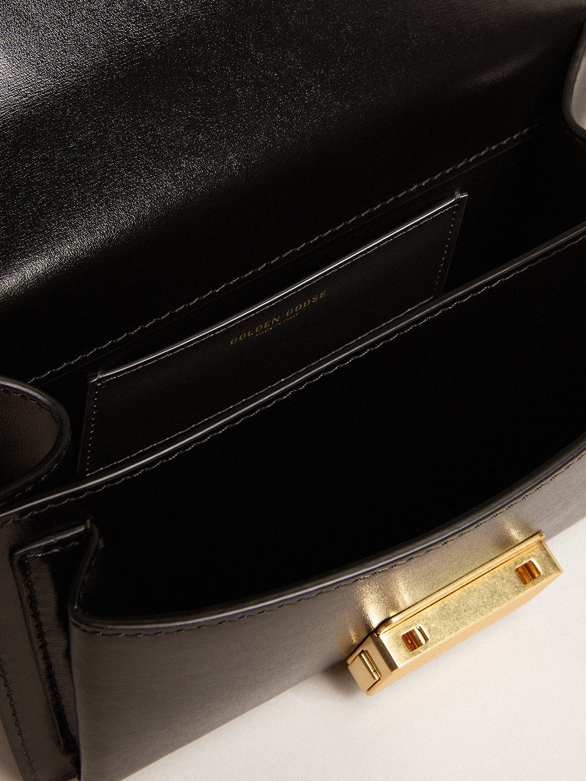 Golden Goose Small Venezia Bag in black boarded leather with silk scarf and charm