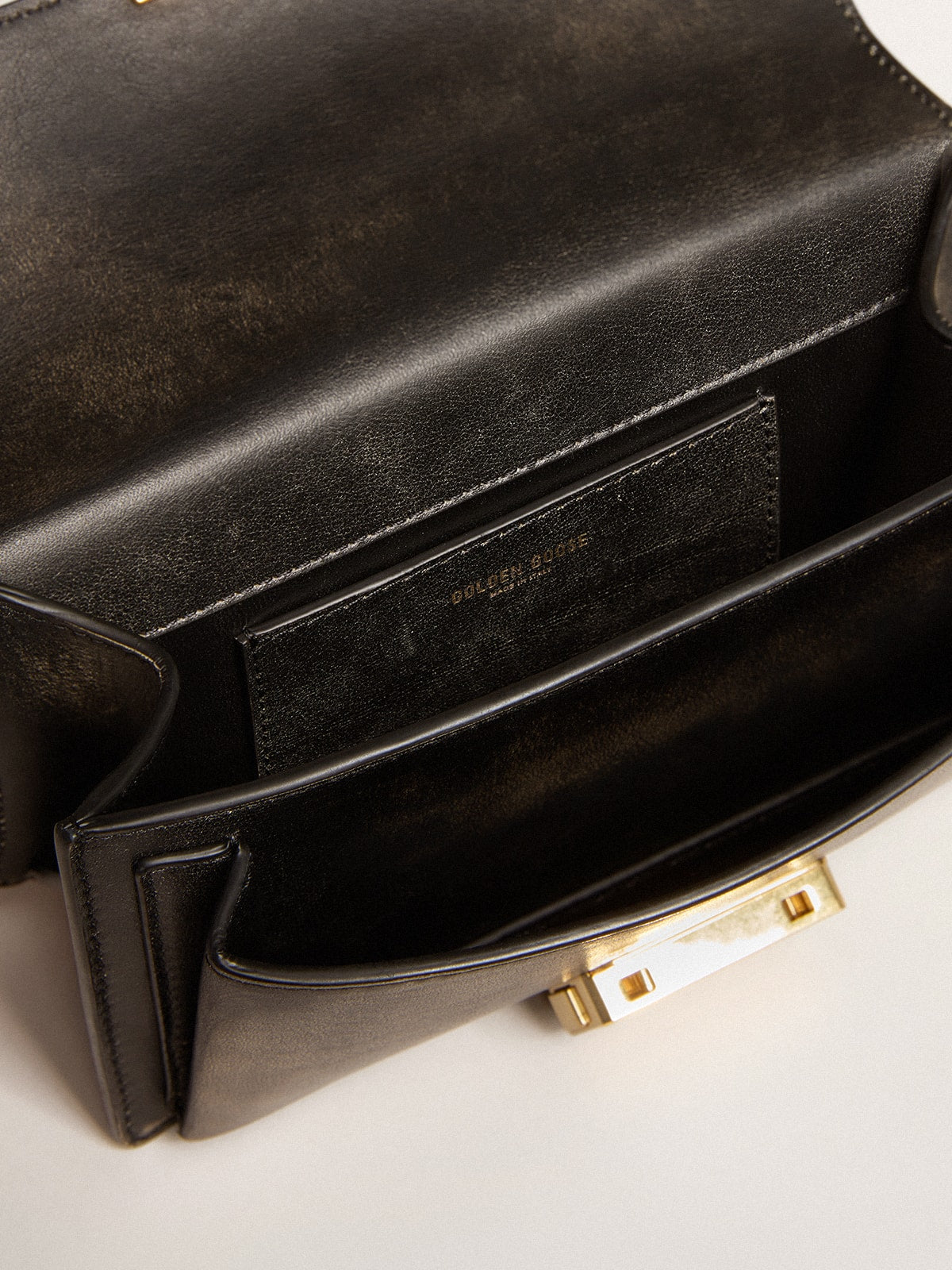 Golden Goose Small Venezia Bag in black distressed leather with gold details