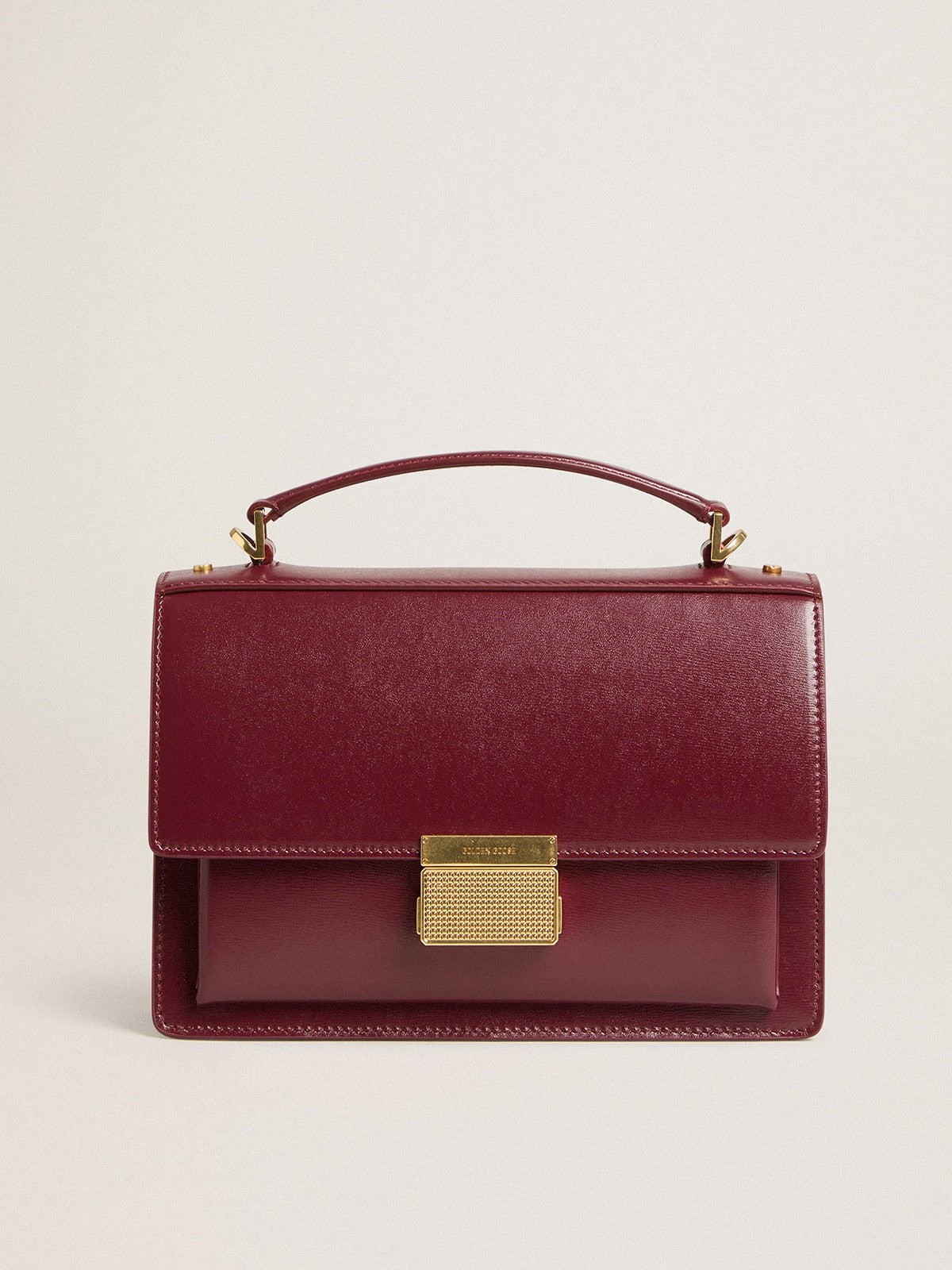 Golden Goose Venezia Bag in burgundy boarded leather with gold details