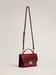Golden Goose Venezia Bag in burgundy boarded leather with gold details