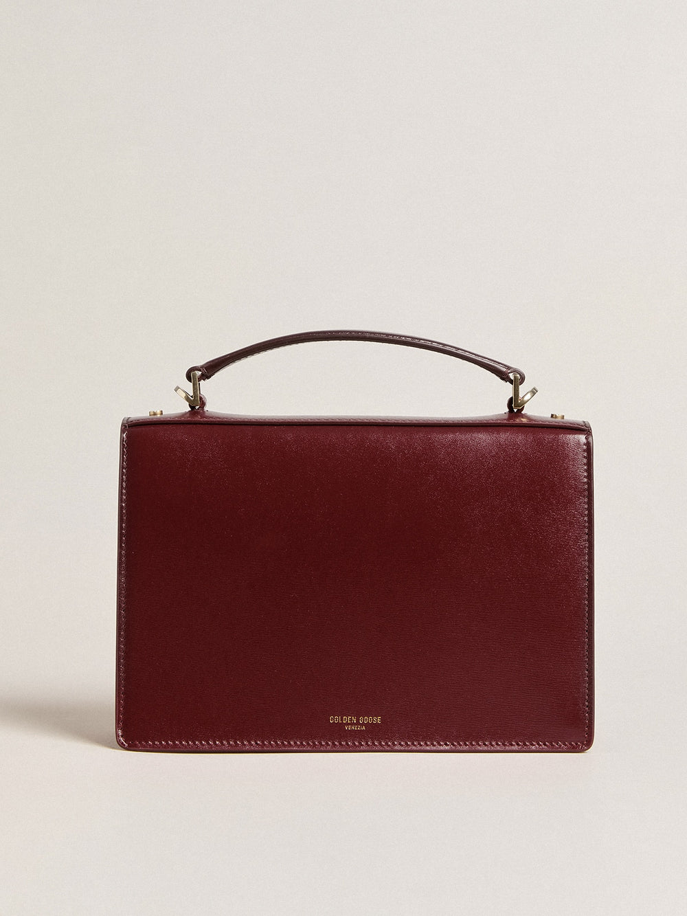 Golden Goose Venezia Bag in burgundy boarded leather with gold details