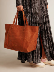 Golden Goose Pasadena Bag in tan-colored glossy hammered leather with gold logo on the front