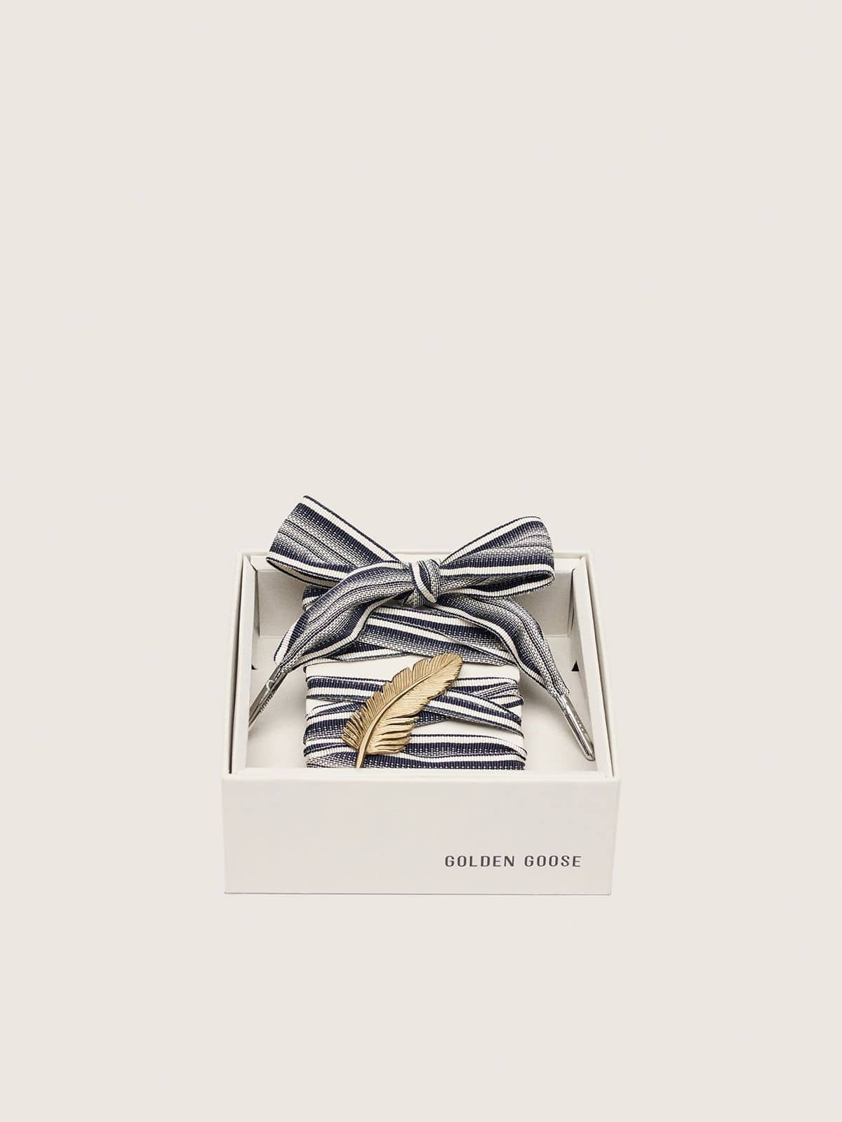 Golden Goose Skins striped laces with gold feather charm
