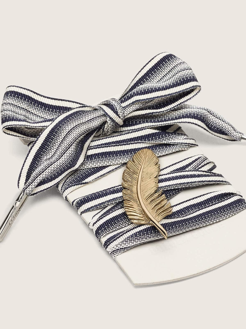 Golden Goose Skins striped laces with gold feather charm
