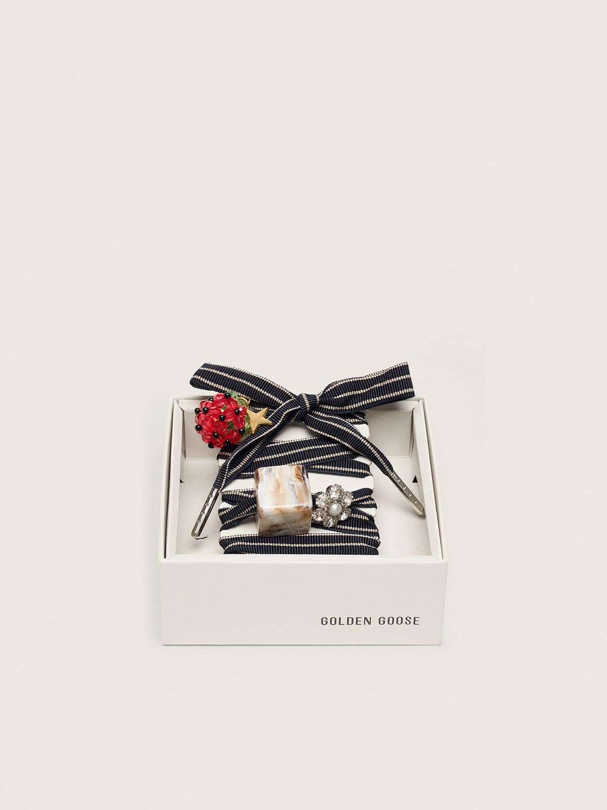 Golden Goose Skins blue and beige striped laces with raspberry, stone and crystal charms