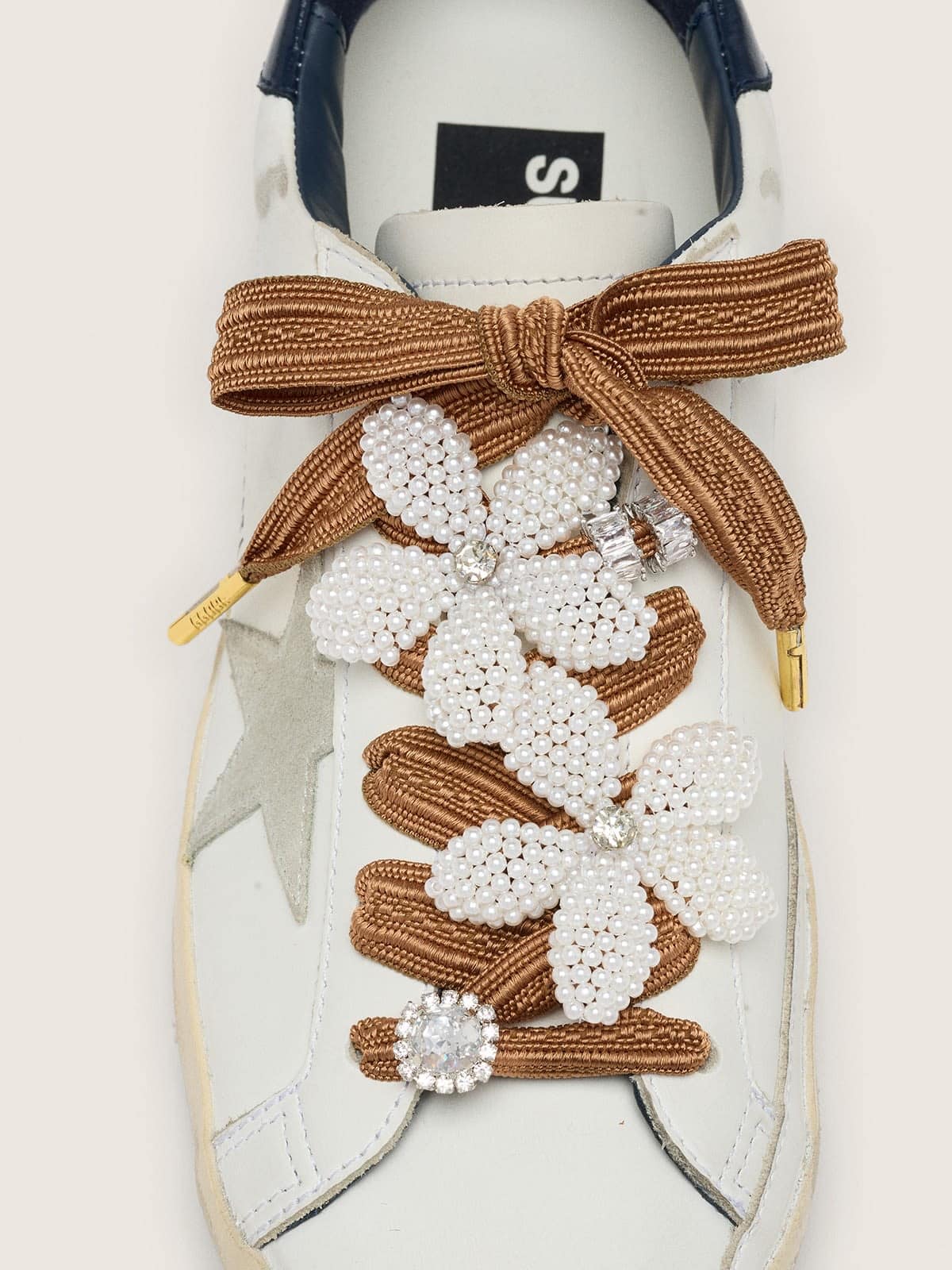 Golden Goose Skins burgundy and peach striped laces with beaded and crystal charms