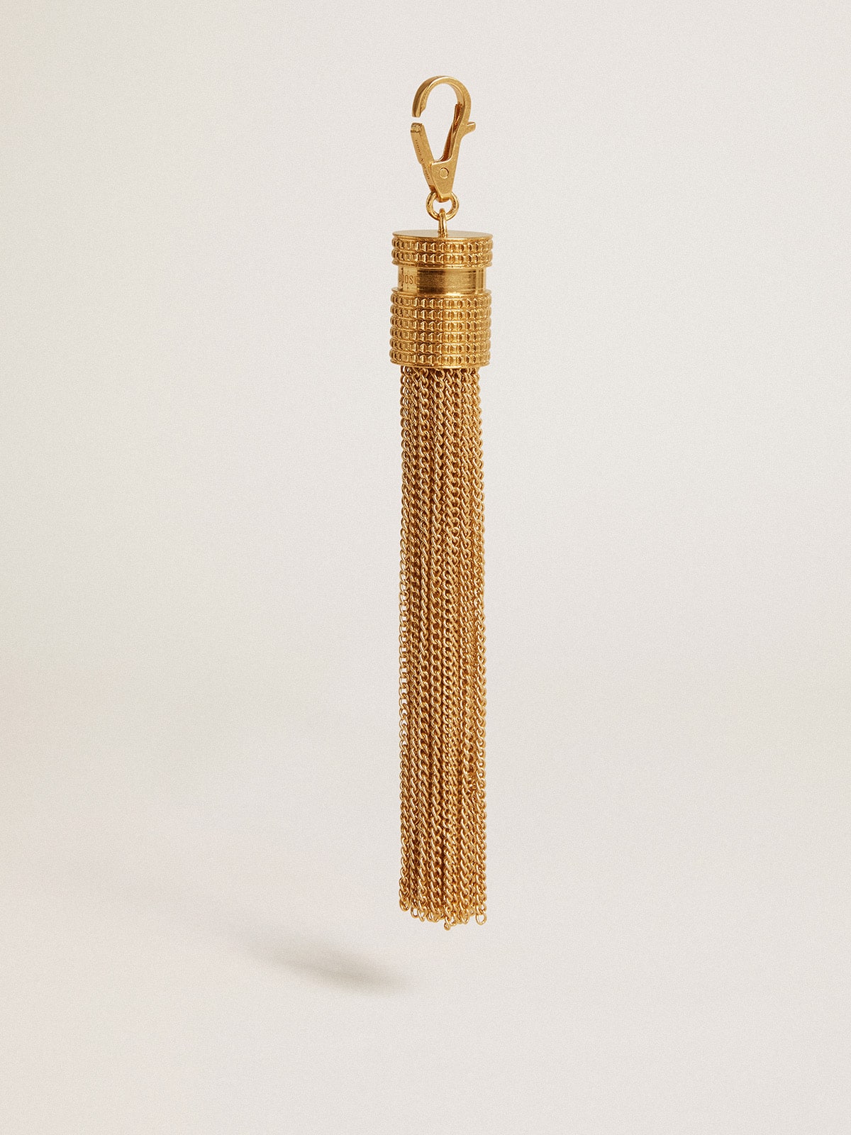 Golden Goose Tassel-shaped charm in antique gold-colored brass