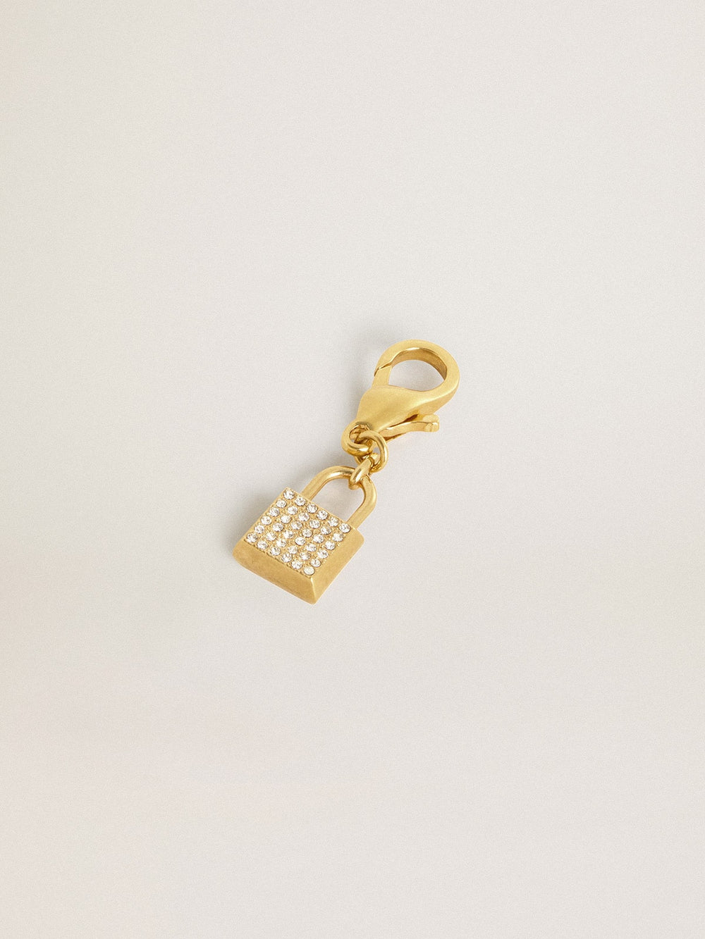 Golden Goose Lock-shaped charm in gold-colored brass with crystals