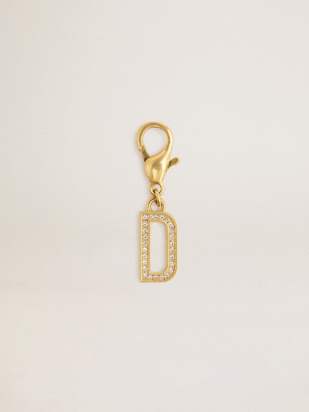 Golden Goose Letter D charm in gold-colored brass with crystals