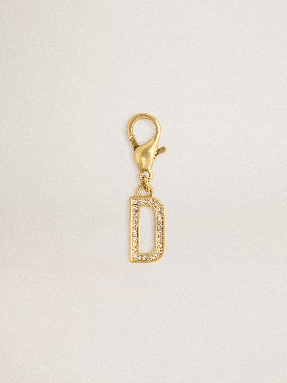 Golden Goose Letter D charm in gold-colored brass with crystals