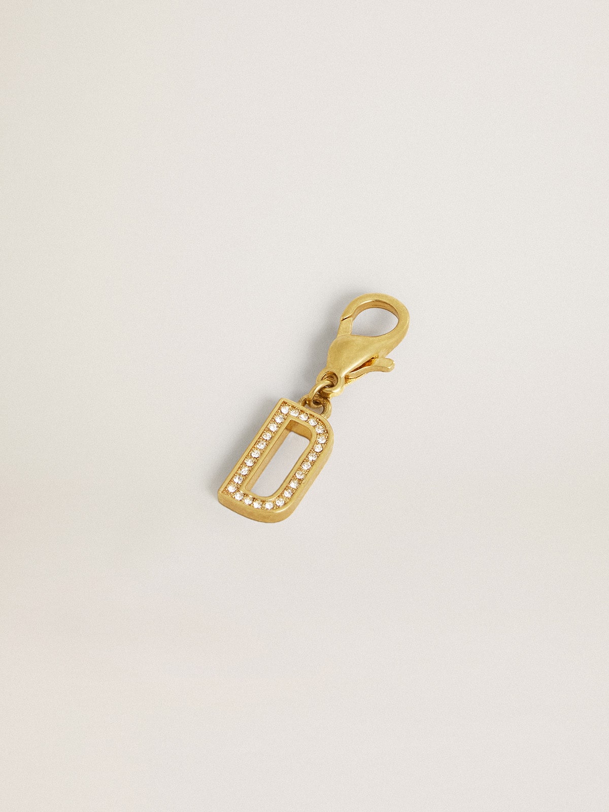 Golden Goose Letter D charm in gold-colored brass with crystals