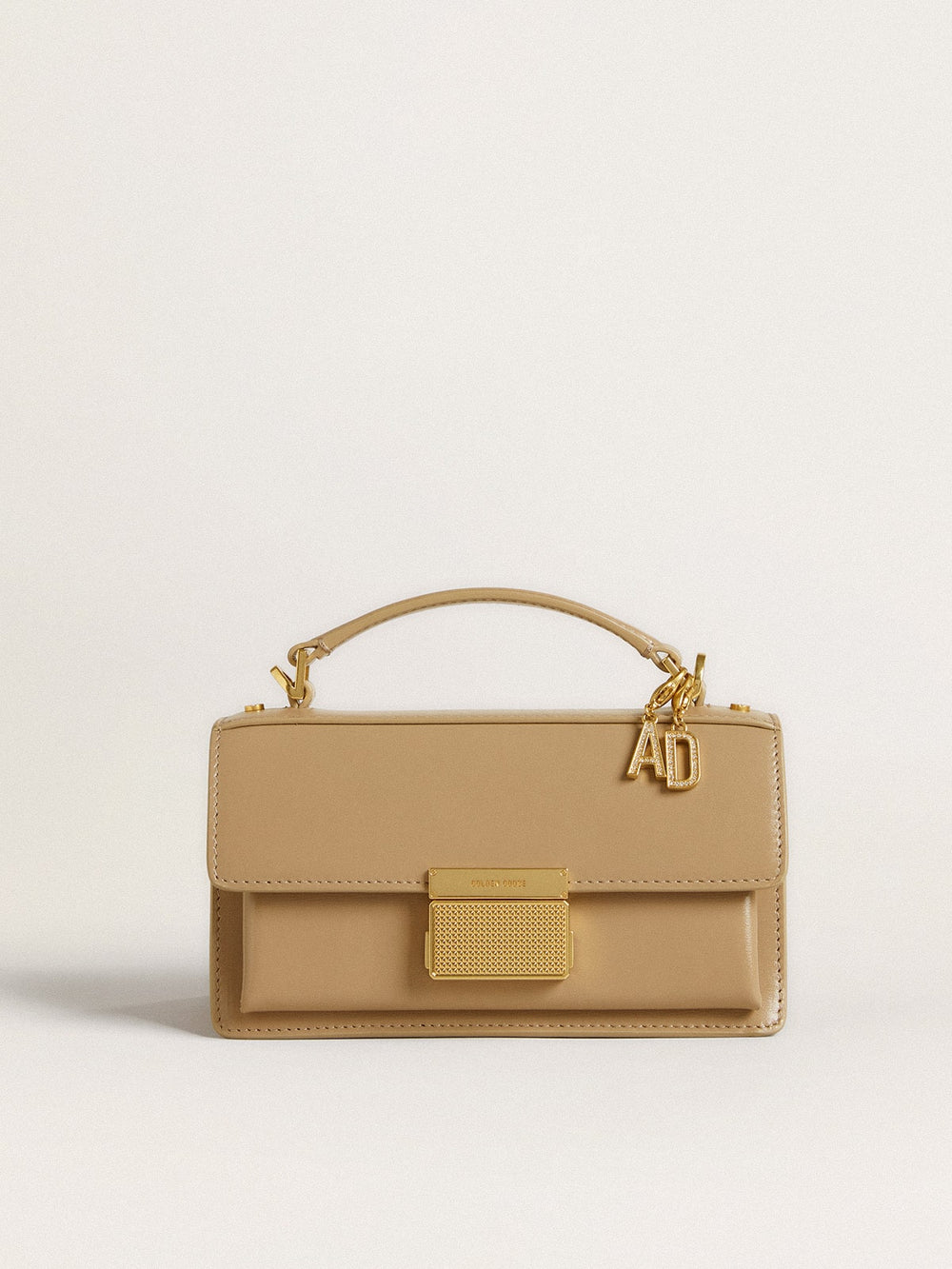 Golden Goose Letter D charm in gold-colored brass with crystals