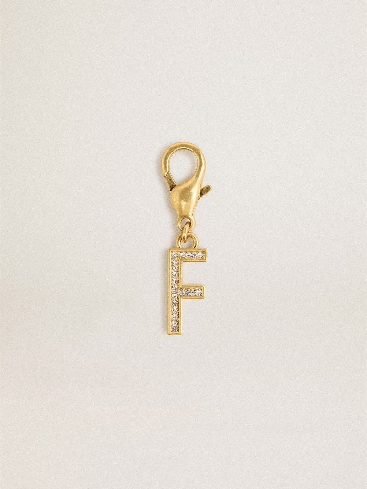 Golden Goose Letter F charm in gold-colored brass with crystals