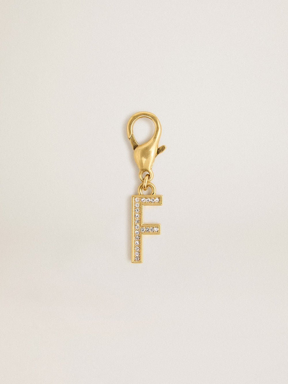 Golden Goose Letter F charm in gold-colored brass with crystals