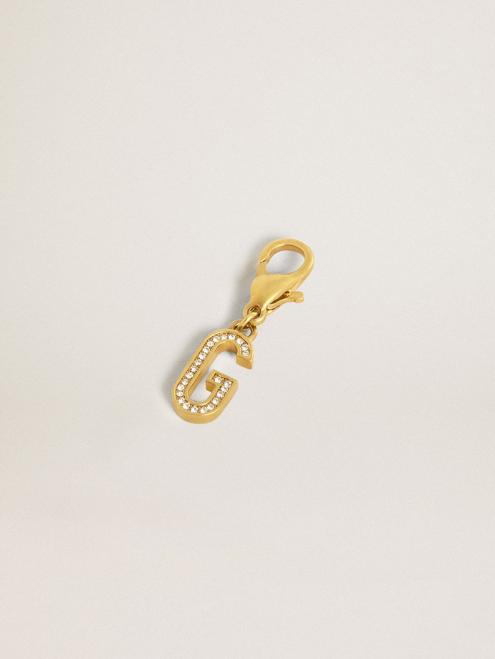 Golden Goose Letter G charm in gold-colored brass with crystals