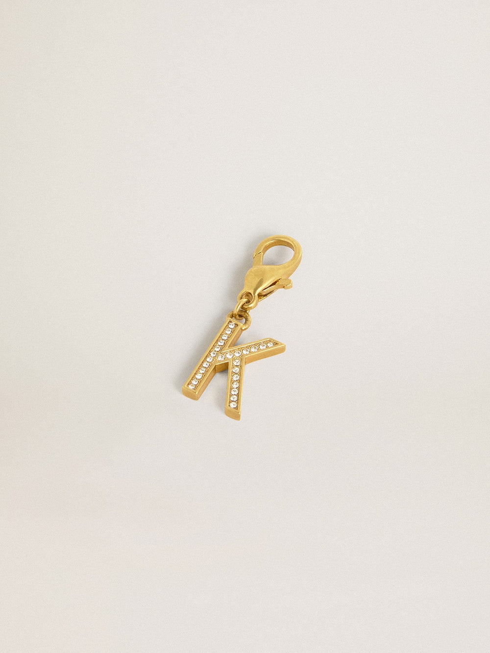 Golden Goose Letter K charm in gold-colored brass with crystals