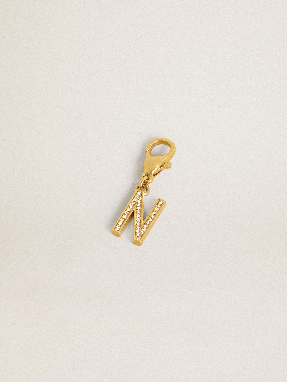 Golden Goose Letter N charm in gold-colored brass with crystals
