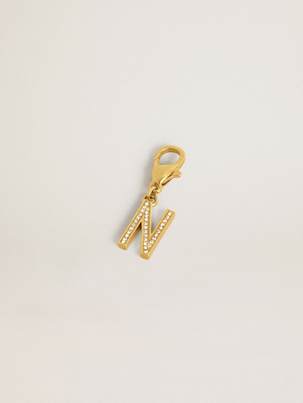 Golden Goose Letter N charm in gold-colored brass with crystals