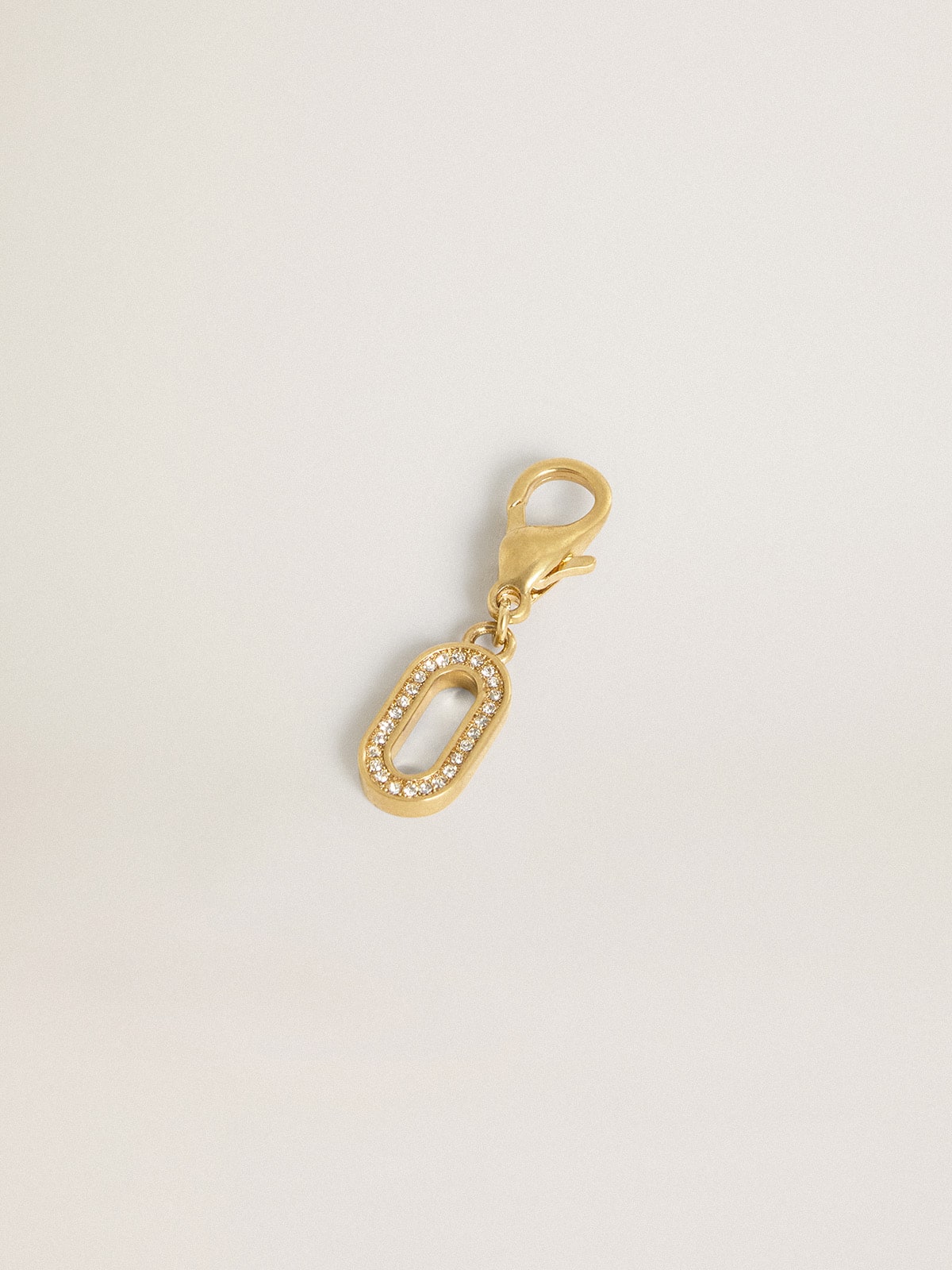 Golden Goose Letter O charm in gold-colored brass with crystals