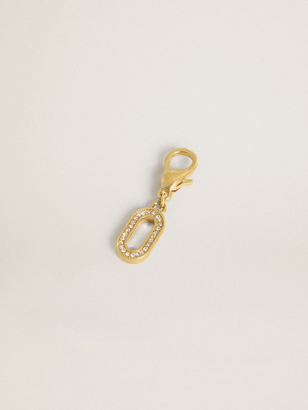 Golden Goose Letter O charm in gold-colored brass with crystals