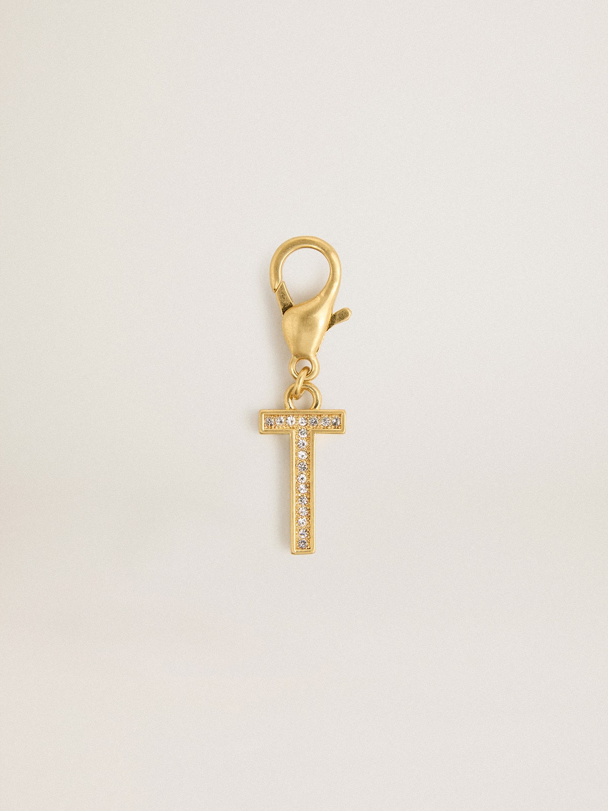 Golden Goose Letter T charm in gold-colored brass with crystals