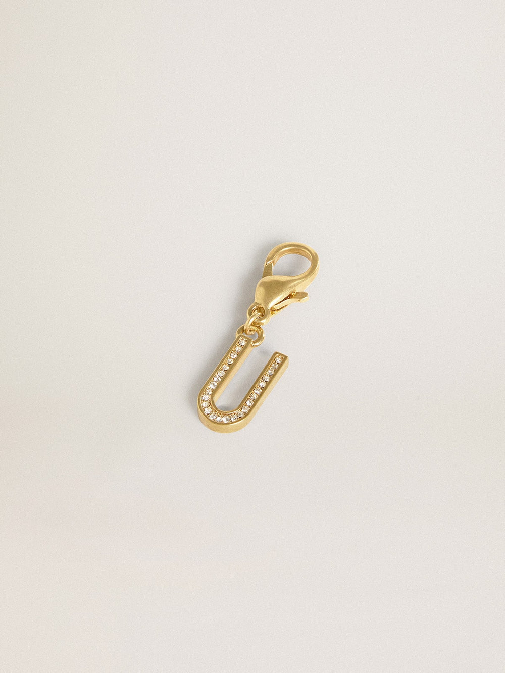 Golden Goose Letter U charm in gold-colored brass with crystals