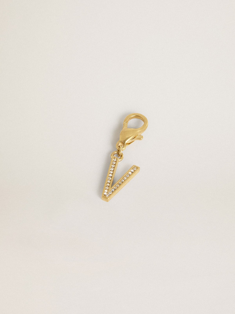 Golden Goose Letter V charm in gold-colored brass with crystals
