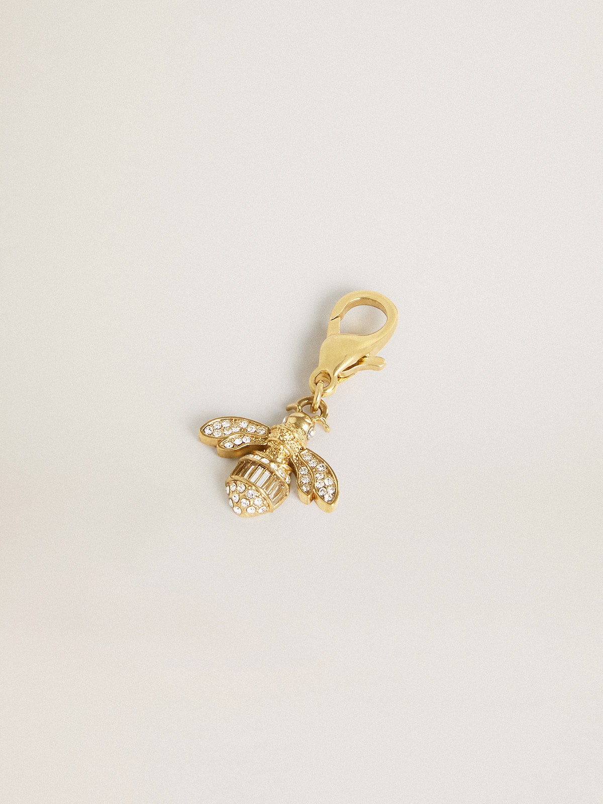 Golden Goose Bee-shaped charm in gold-colored brass with crystals