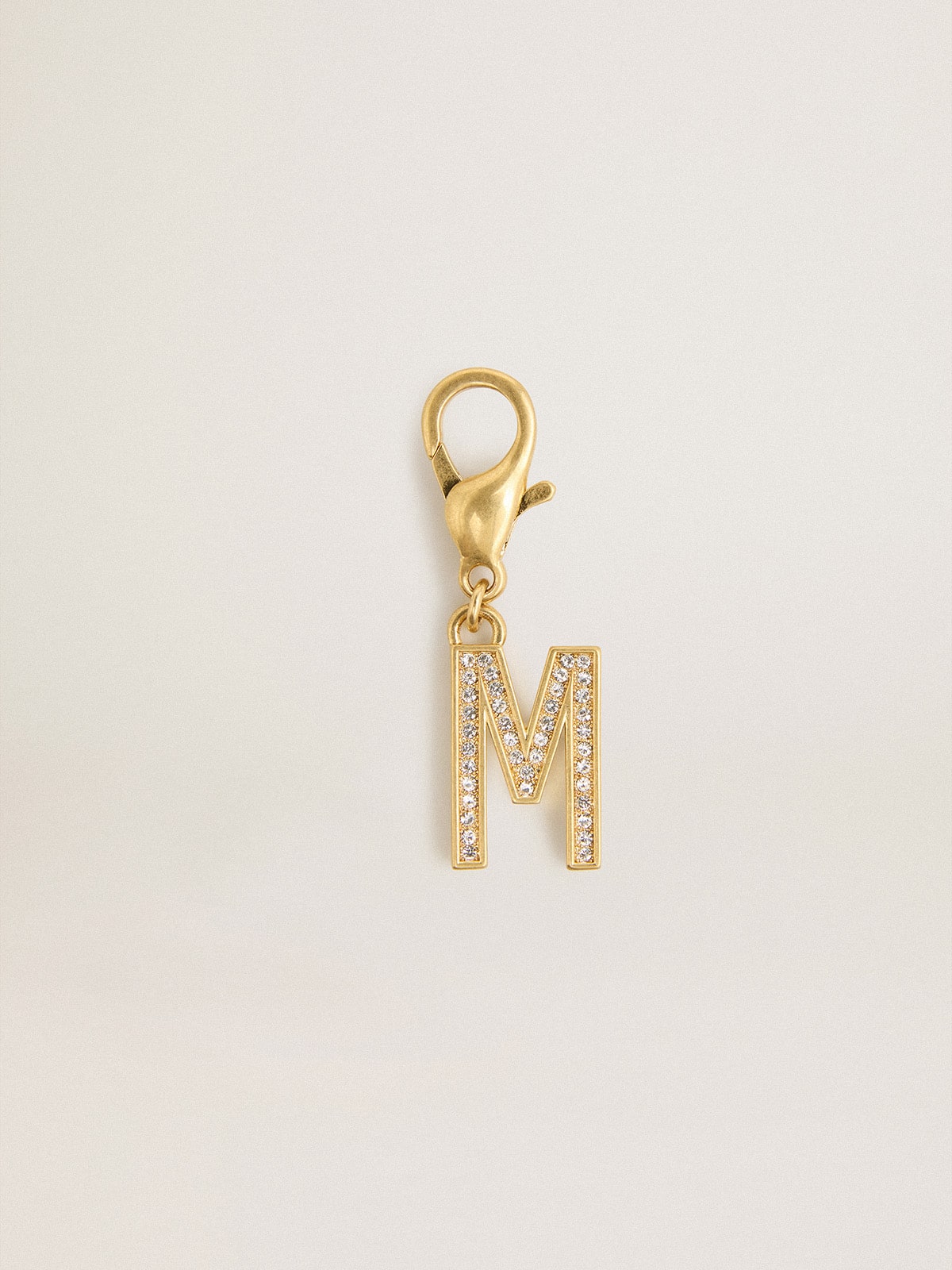 Golden Goose Letter M charm in gold-colored brass with crystals