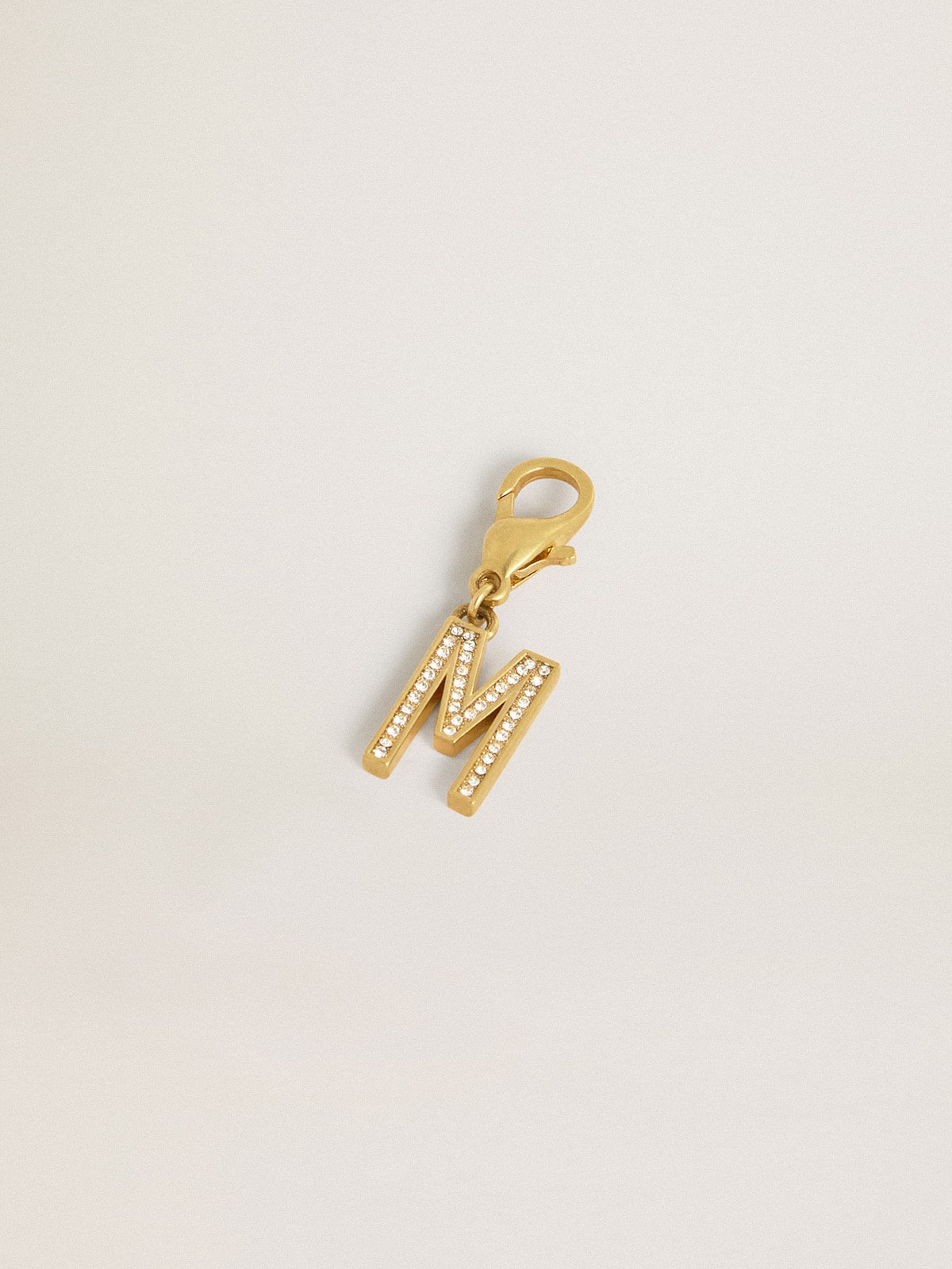 Golden Goose Letter M charm in gold-colored brass with crystals