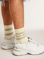 Golden Goose Worn-white socks with distressed details and sage-green stripes