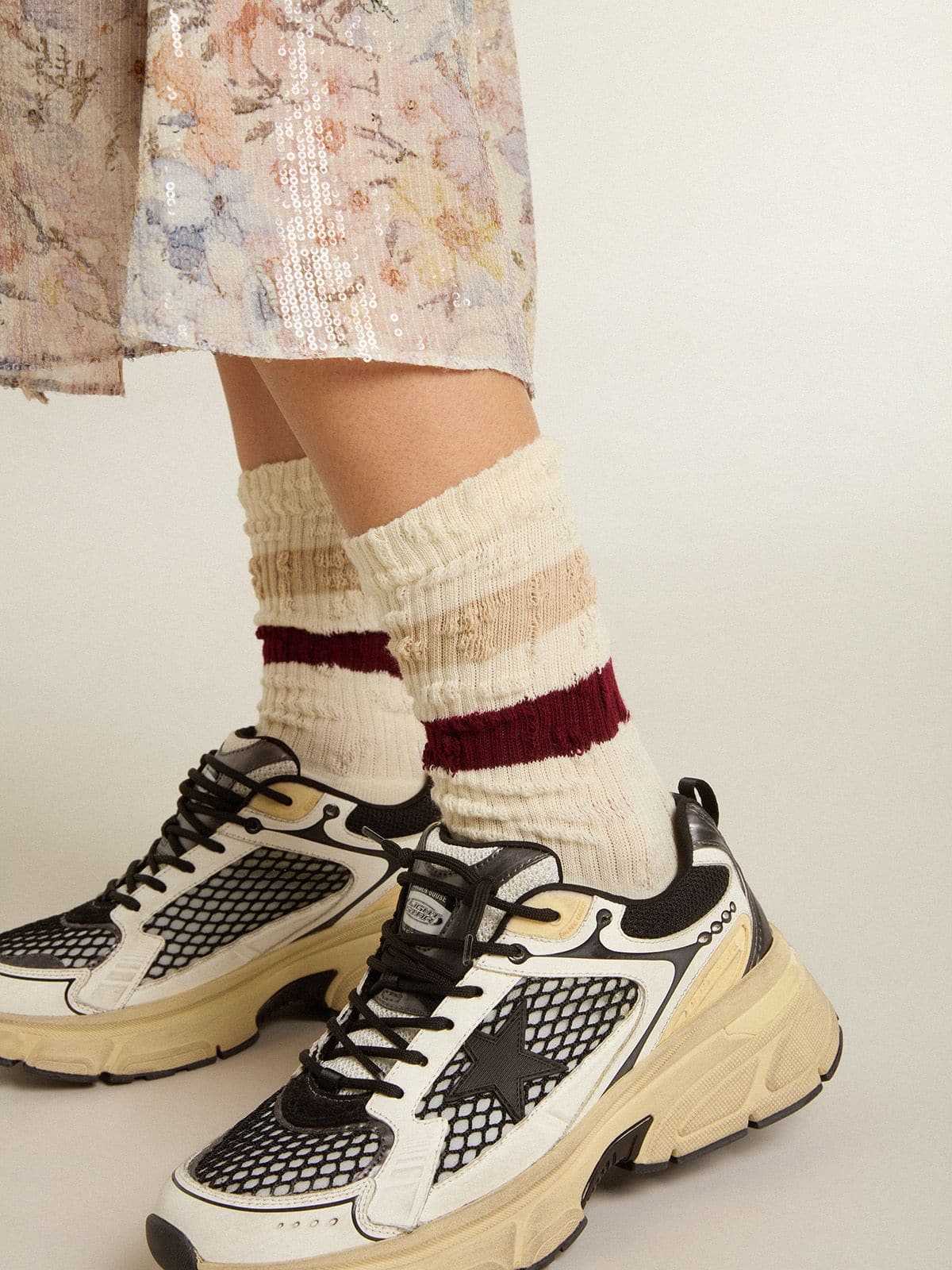 Golden Goose Worn-white socks with distressed details and beige and burgundy stripes