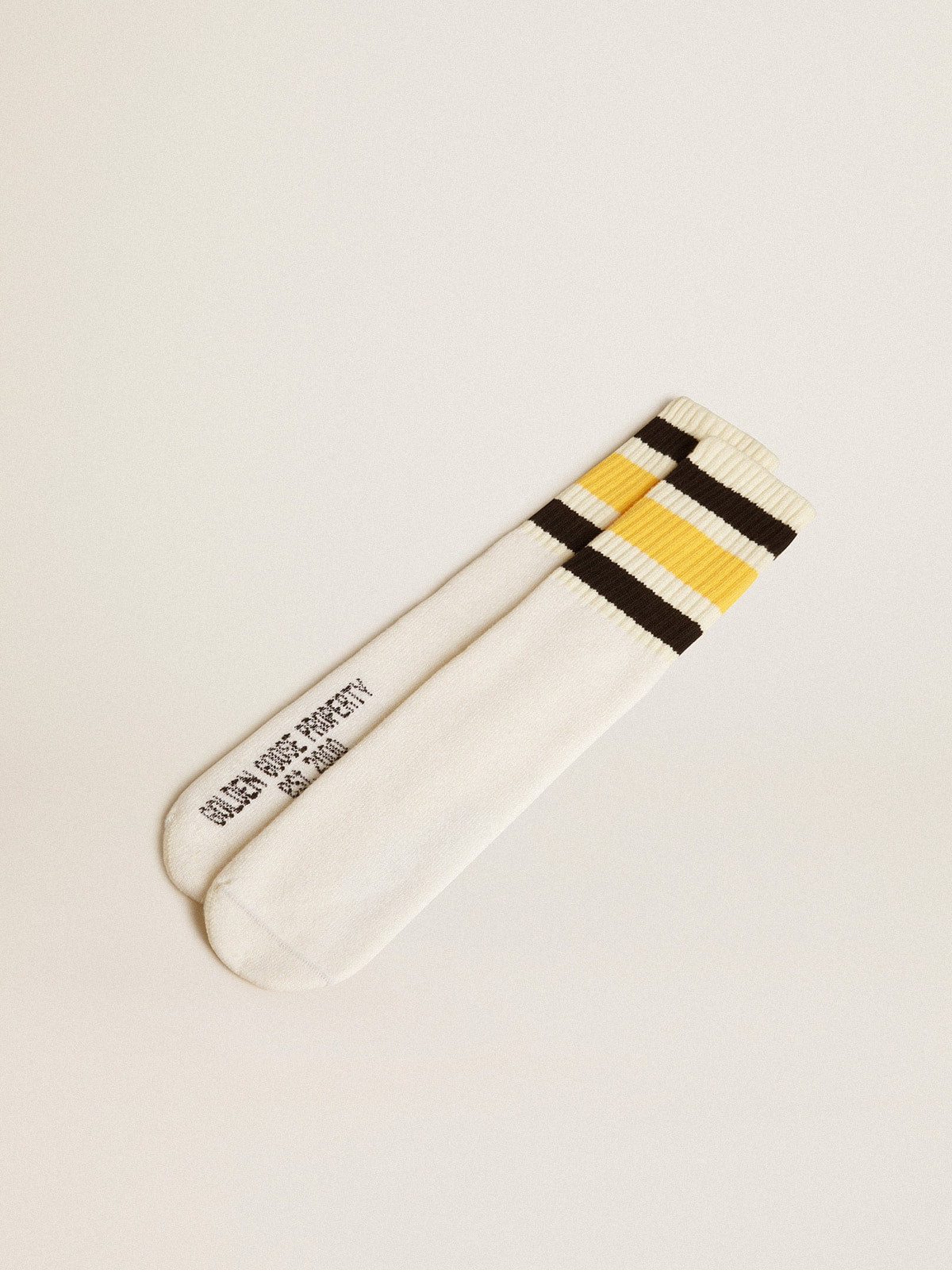 Golden Goose Worn-white socks with distressed details and black and yellow stripes