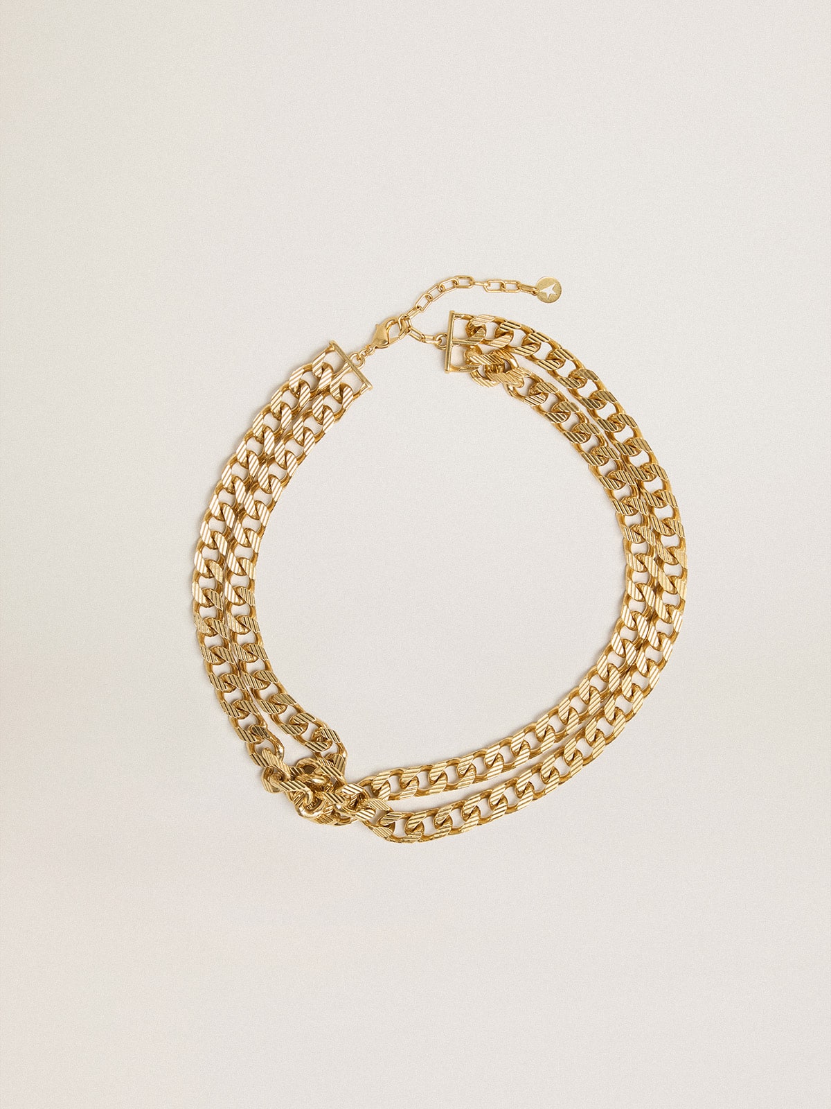 Golden Goose Antique gold-colored braided chain necklace with star-shaped clasp