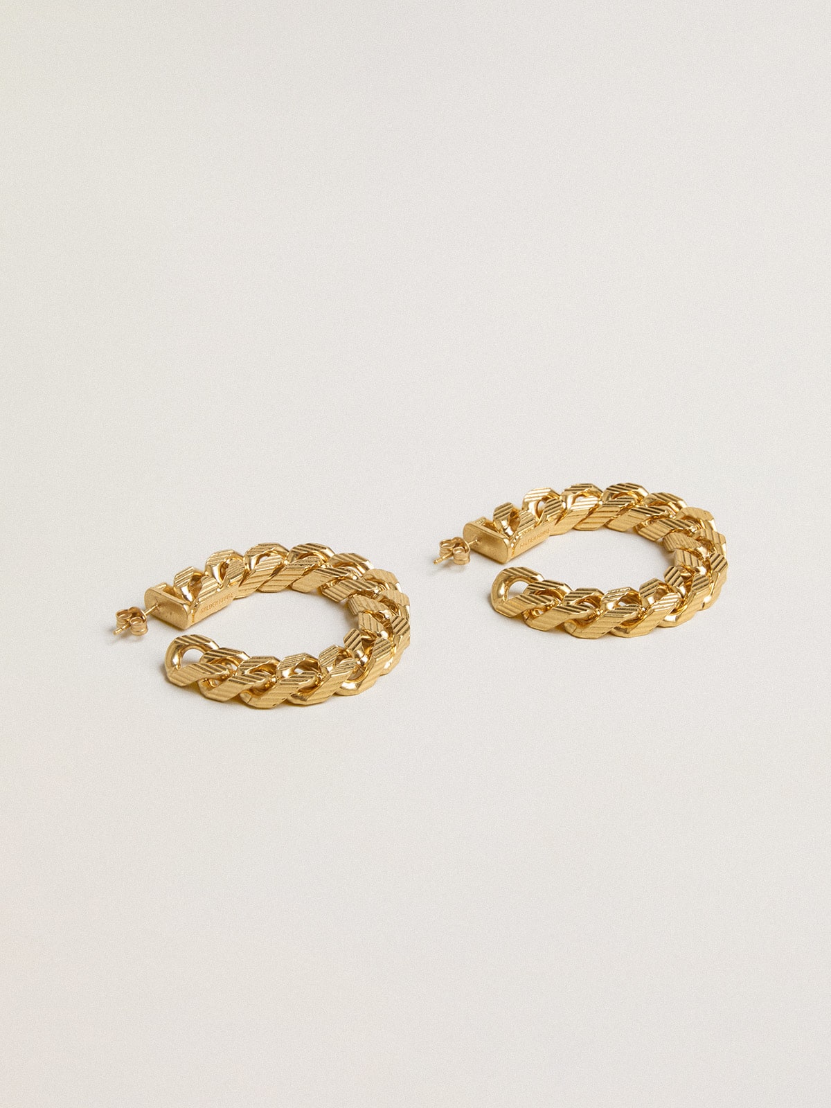 Golden Goose Chain hoop earrings with antique gold colored braided links