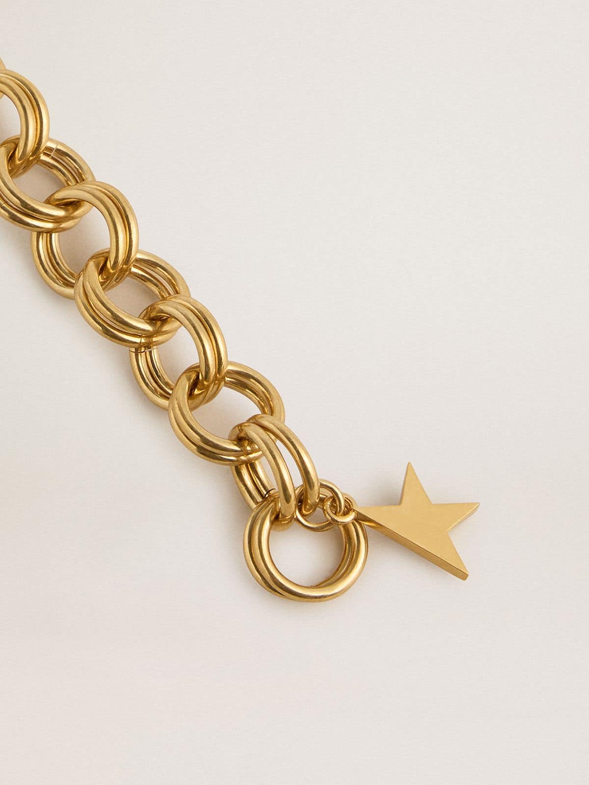 Golden Goose Antique gold-colored woven chain bracelet with star-shaped clasp