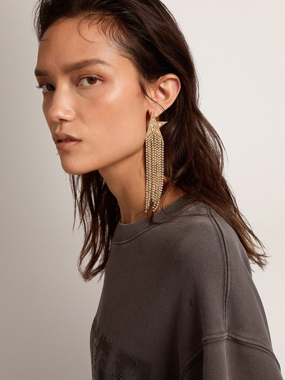 Golden Goose Women's single drop earring in antique gold color with decorative crystals