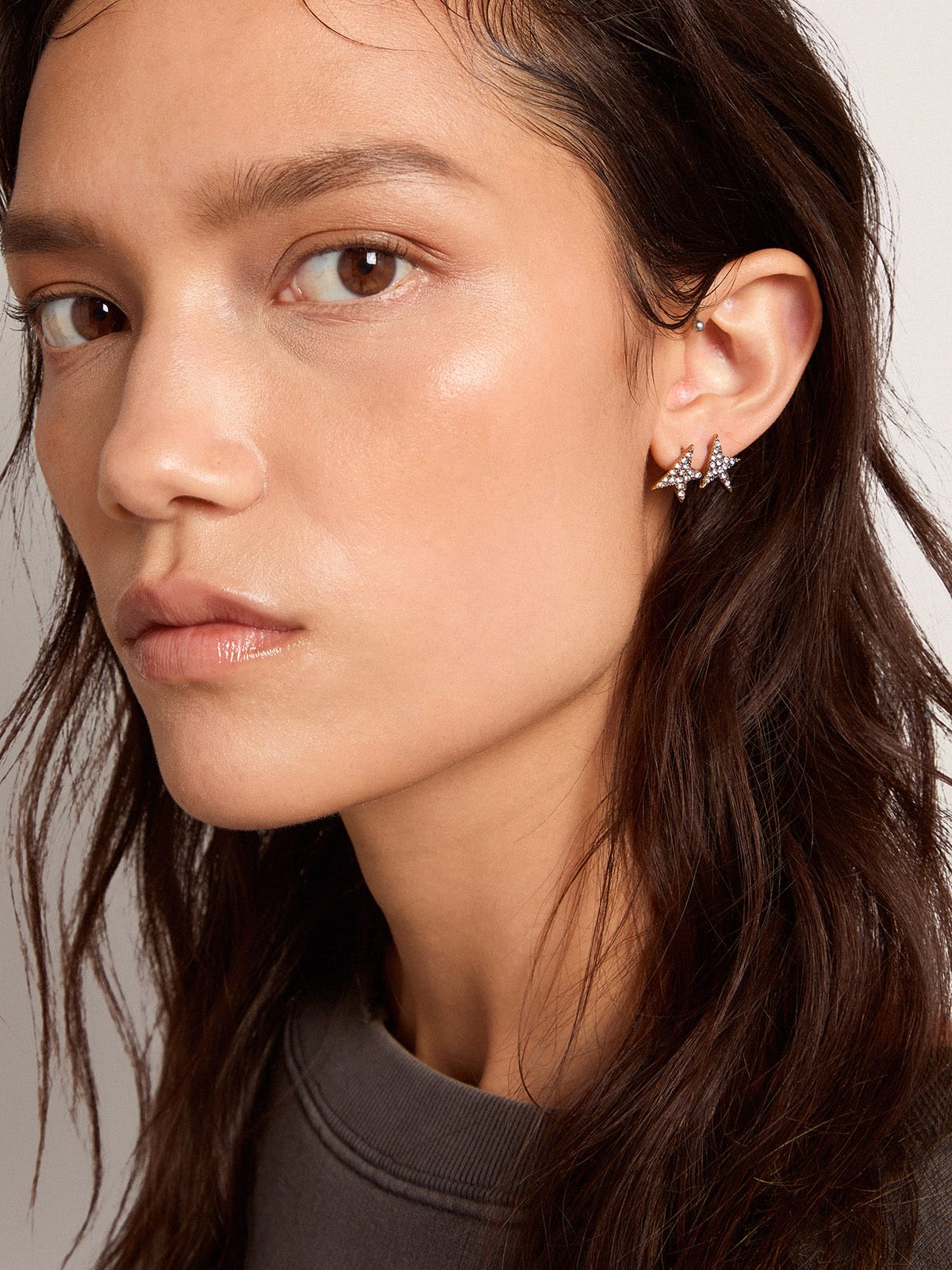 Golden Goose Women's stud earrings in antique gold color with crystals