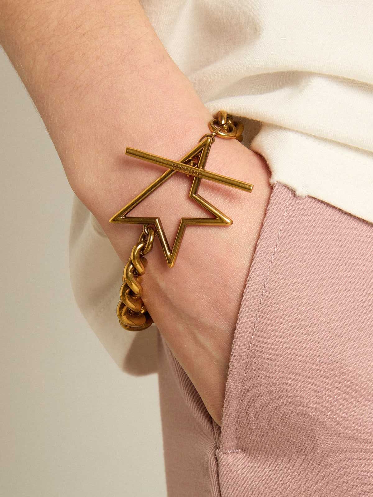 Golden Goose Bracelet in antique gold decreasing chain with star-shaped clasp