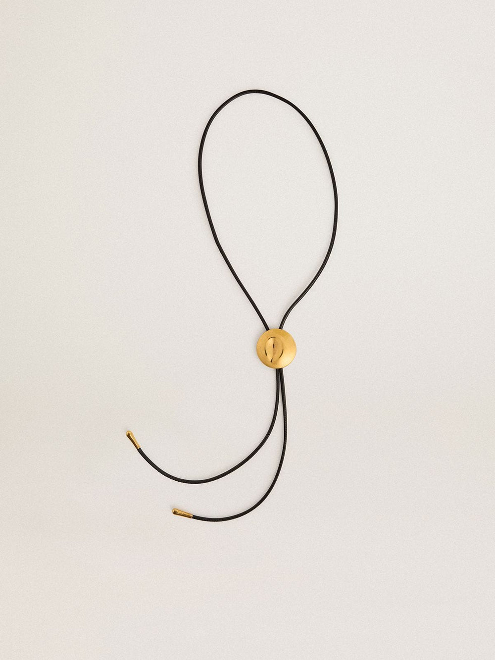 Golden Goose Jewelmates bolo tie necklace in black leather with antique gold metal detail