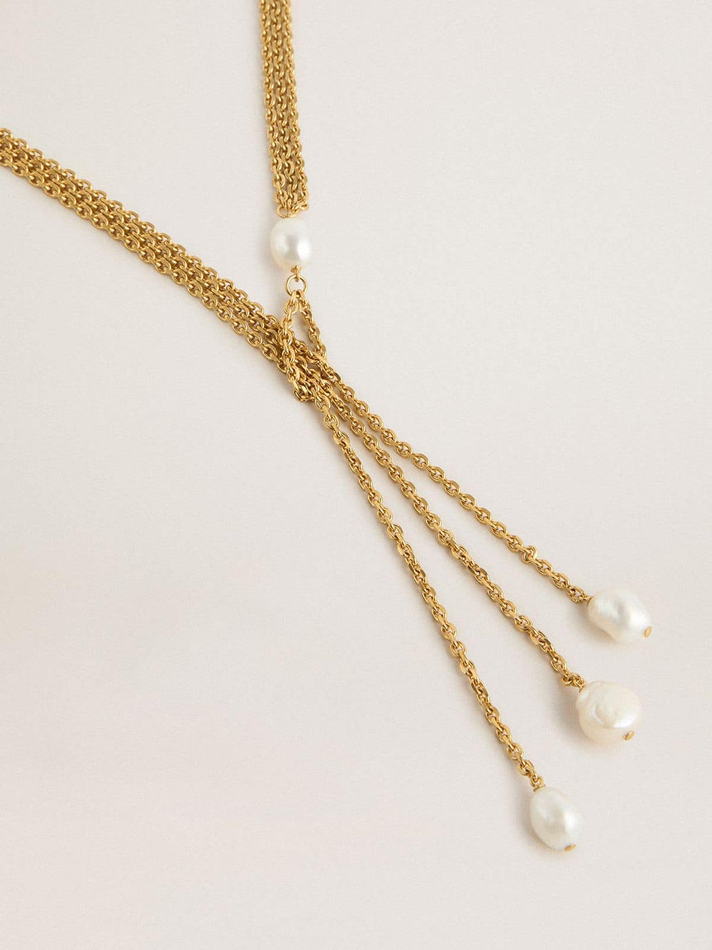 Golden Goose Necklace with antique gold-colored chains with pearls