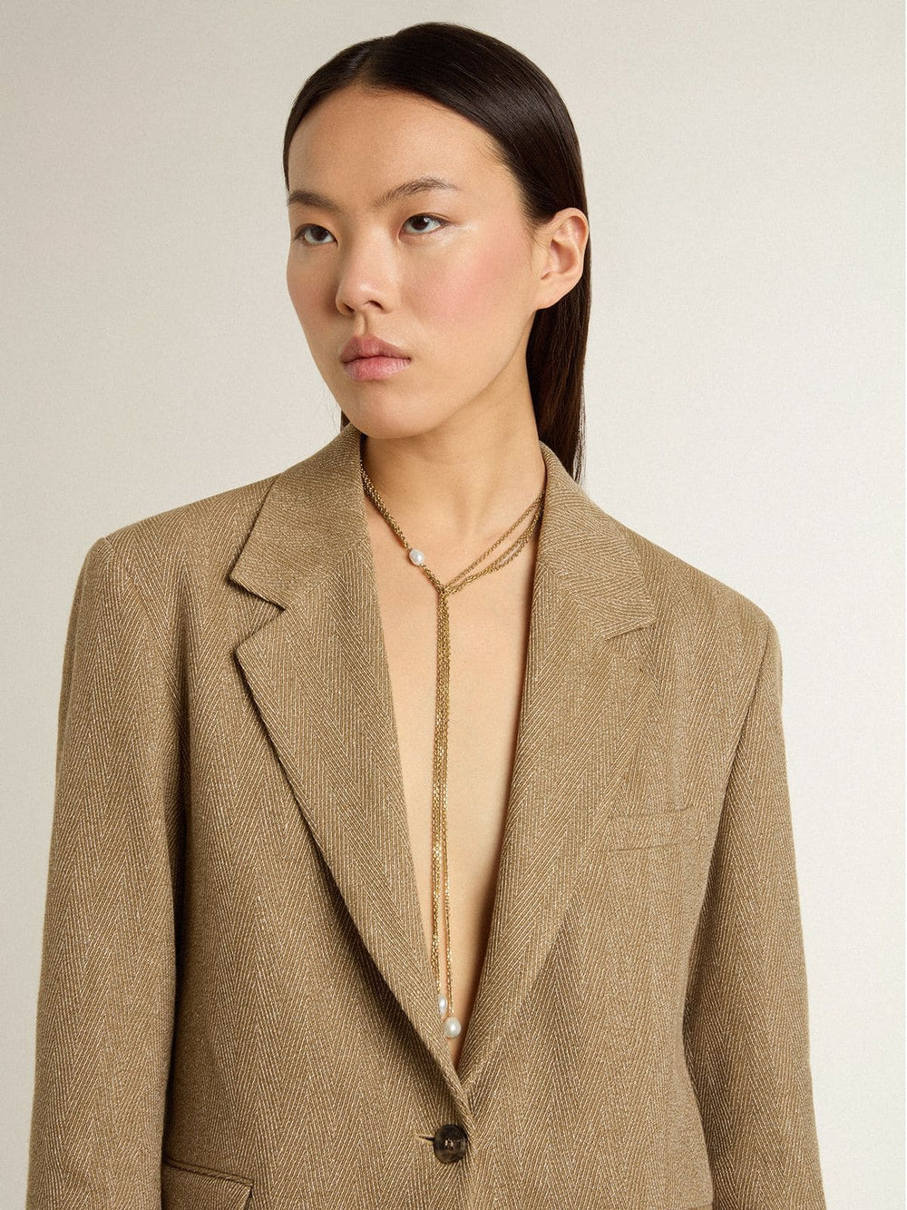 Golden Goose Necklace with antique gold-colored chains with pearls