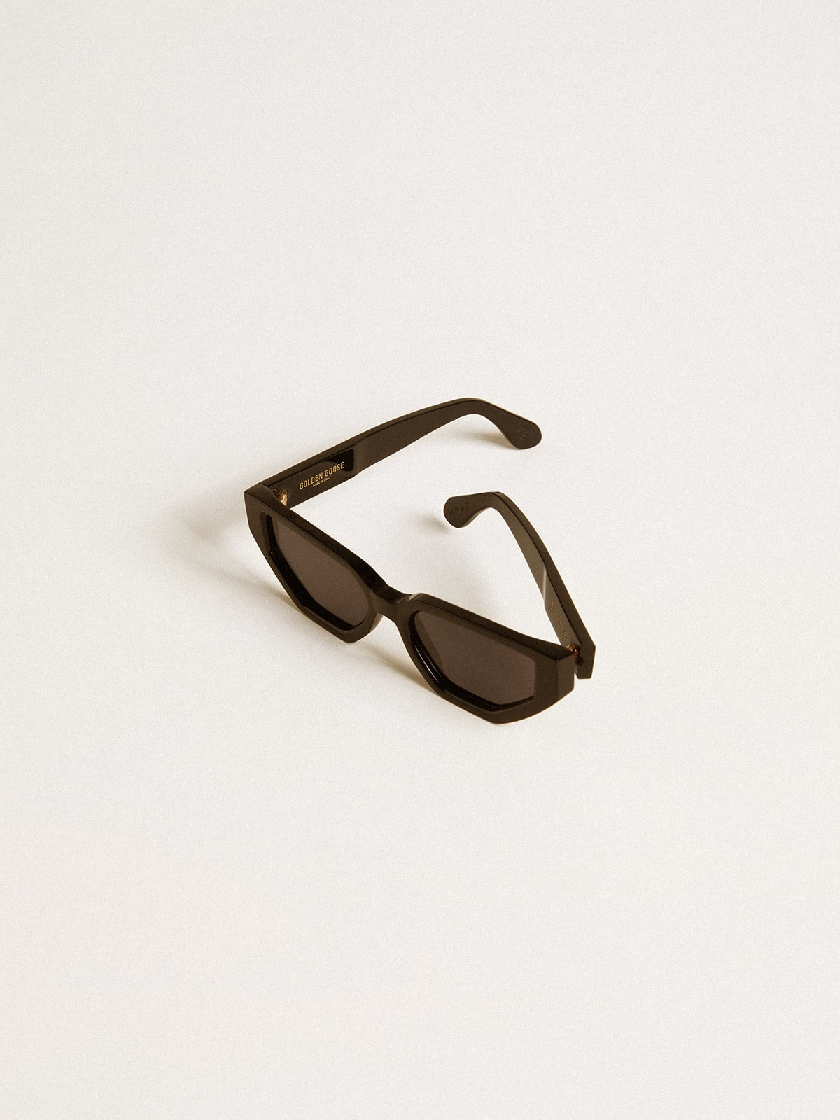 Golden Goose Rectangular style sunglasses with black frame and lenses