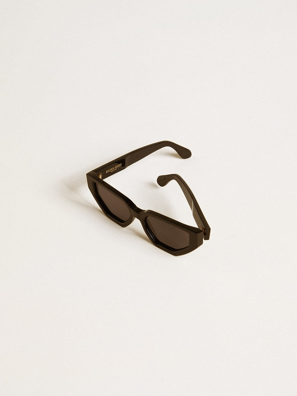 Golden Goose Rectangular style sunglasses with black frame and lenses