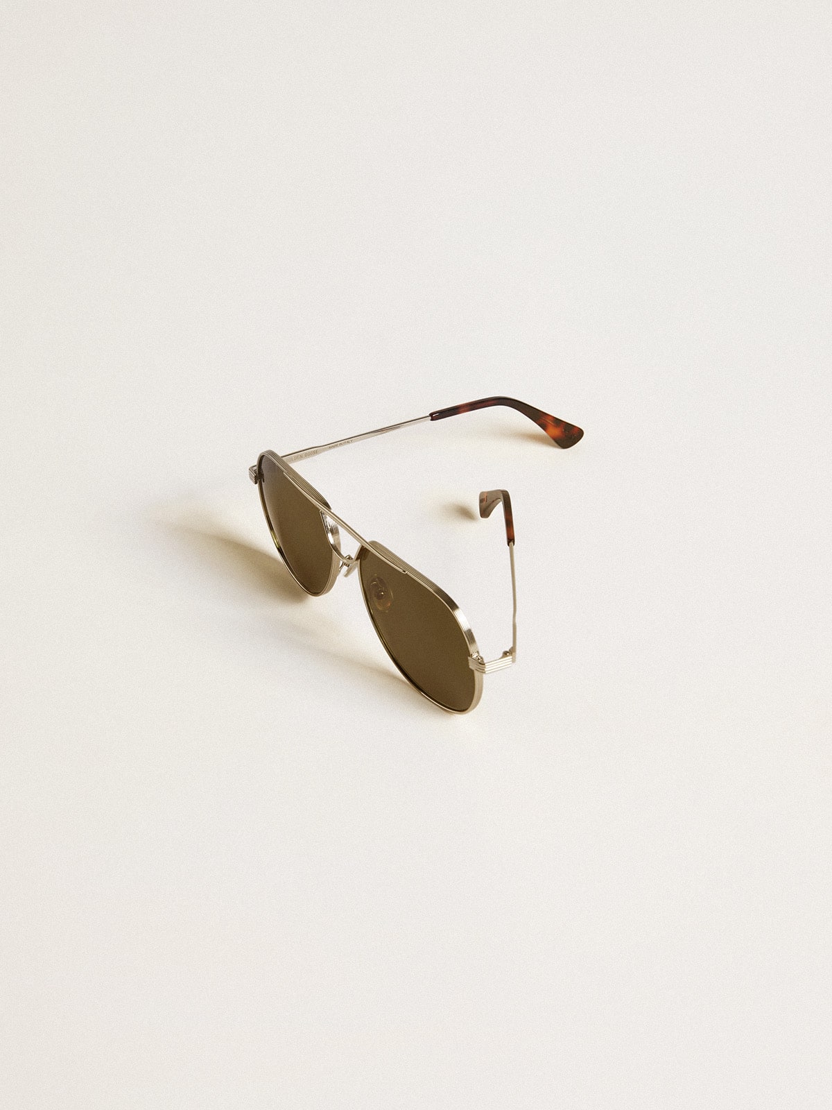 Golden Goose Aviator sunglasses with silver frame and green lenses